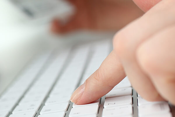 american-companies-debit-their-clients-accounts-without-touching-their-money Typing on Keyboard